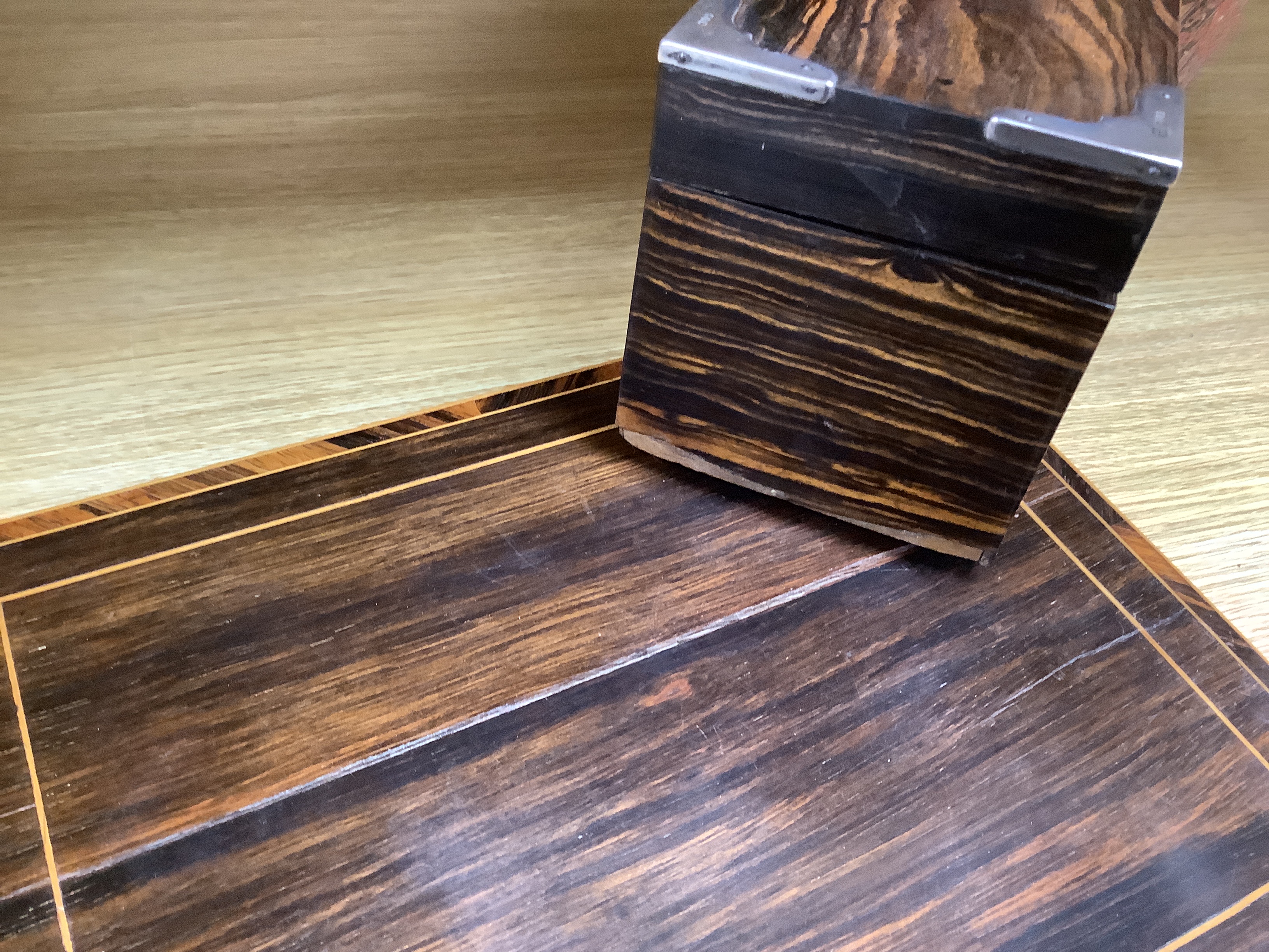 A 19th century coromandel writing slope with bone lock escutcheon and a Victorian silver mounted stationery box, largest 30cm wide